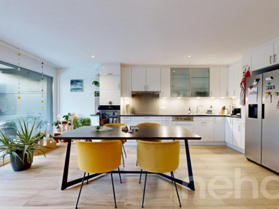 Appartement en rez-de-jardin avec terrasse et jardin à Prangins image 4