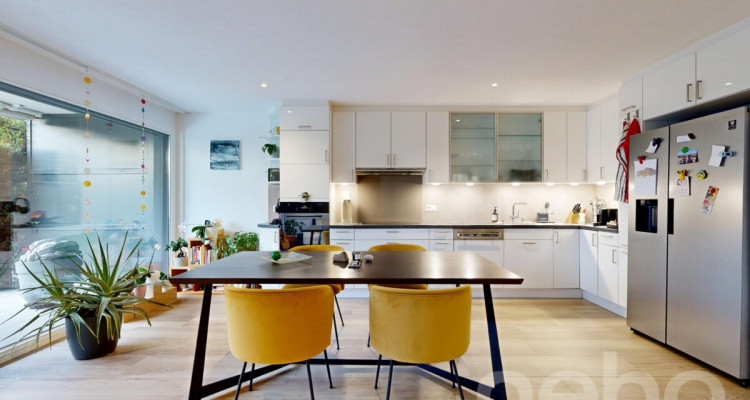 Appartement en rez-de-jardin avec terrasse et jardin à Prangins image 4