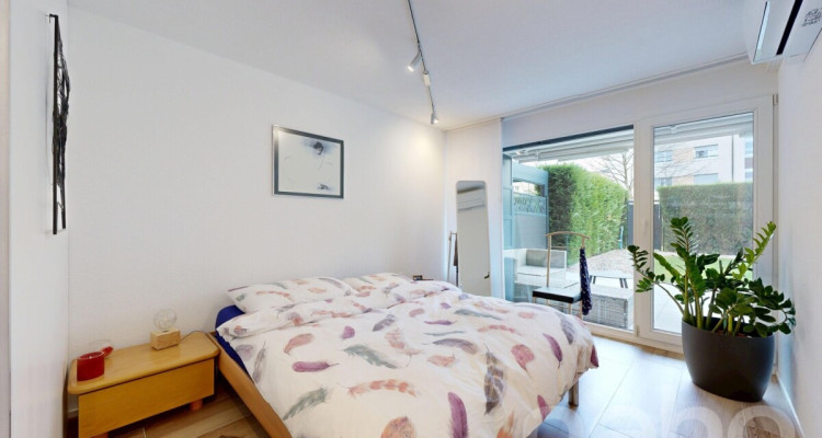 Appartement en rez-de-jardin avec terrasse et jardin à Prangins image 7