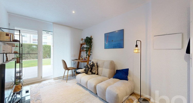 Appartement en rez-de-jardin avec terrasse et jardin à Prangins image 8