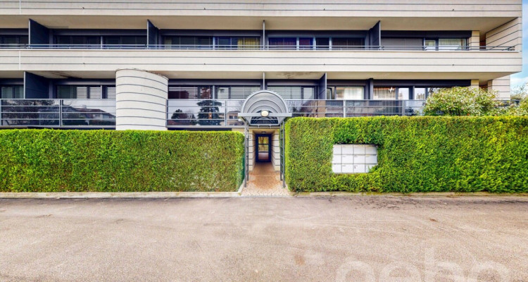 Appartement en rez-de-jardin avec terrasse et jardin à Prangins image 10