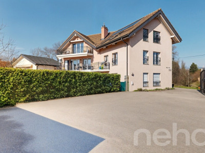 Spacieux appartement familial avec balcons et jardin à St-Prex image 1