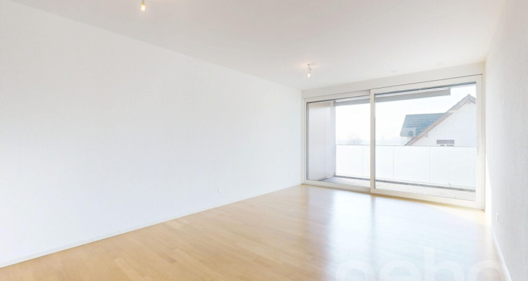 Moderne 3.5-Zimmer-Wohnung mit grossem Balkon und 2 Garagenplätzen image 2