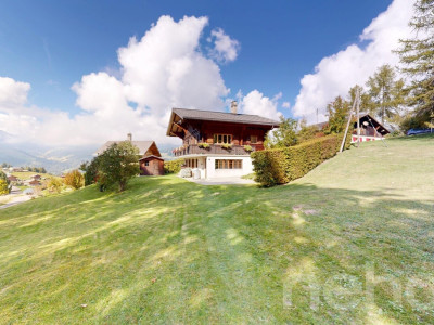 Exclusif: Magnifique chalet de 4 chambres avec grand jardin image 1