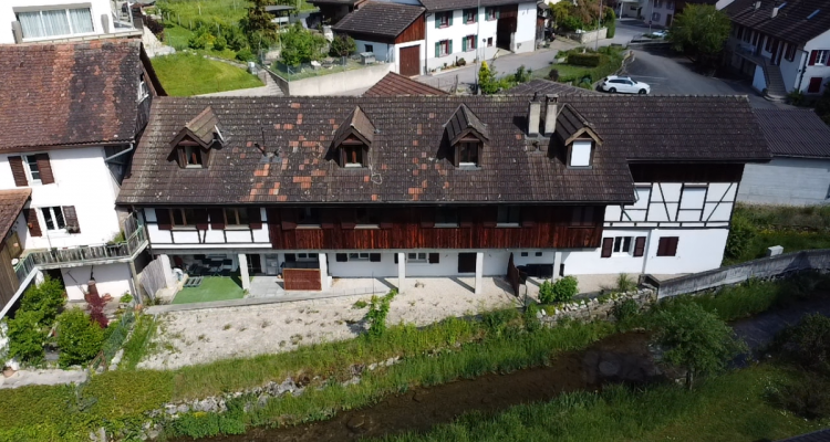 Proche de Bâle immeuble de rendement entièrement rénové de 6 appartements 7 places de parking pas de vacants. image 1