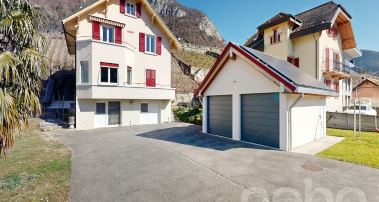 Maison à Aigle avec 2 appartements, vue dégagée et fort potentiel image 1