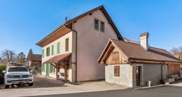 Maison avec trois appartements dans un cadre paisible à Marnand image 7