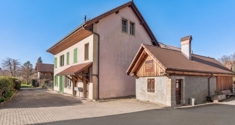 Maison avec trois appartements dans un cadre paisible à Marnand image 10