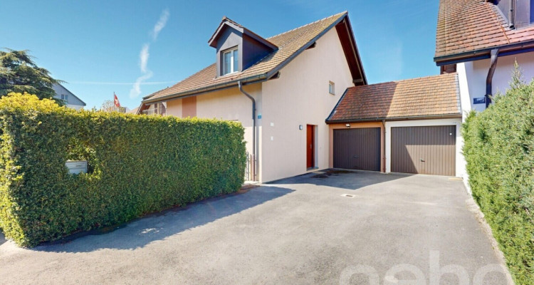 Confort et espace : maison jumelle 5.5 pièces avec jardin à Gland image 1
