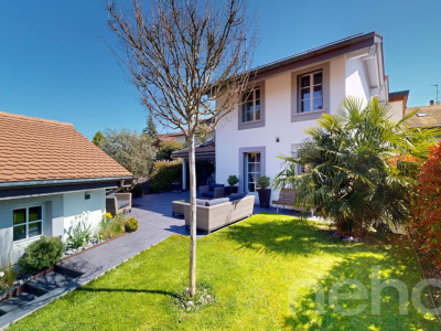 Élégance et confort dans une maison familiale avec jardin à Satigny image 1