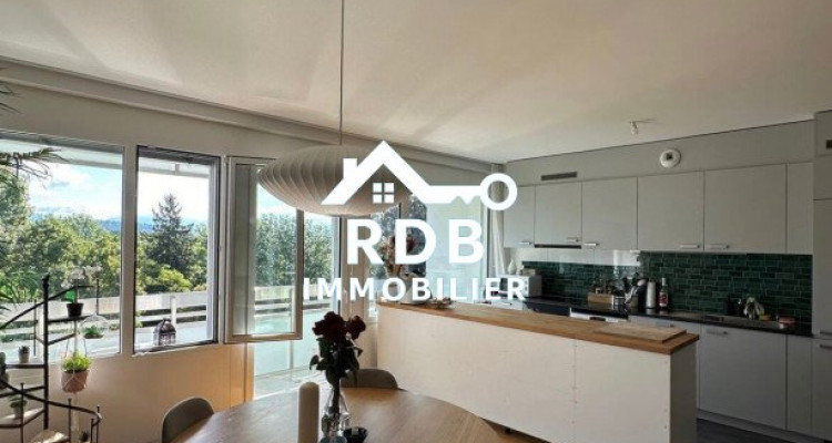 Appartement de 6 pièces au 7ème étage situé à Chêne-Bougeries 1224 image 2