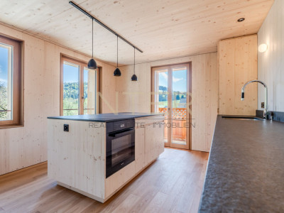 Erstbezug in Risch: Exklusive 3.5-Zimmerwohnung im 2. OG mit 3 Loggien und Cheminée image 2