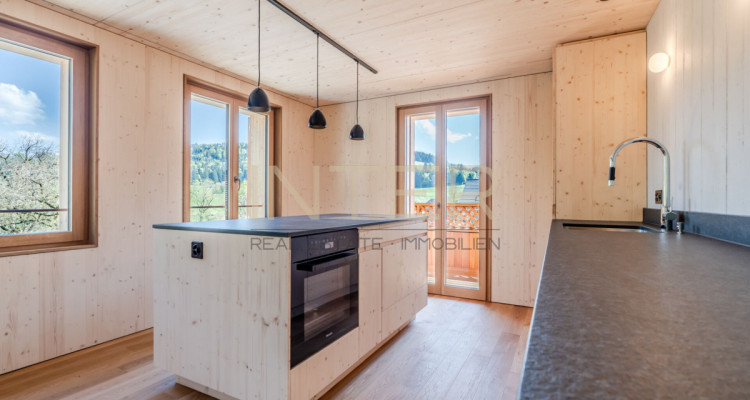 Erstbezug in Risch: Exklusive 3.5-Zimmerwohnung im 2. OG mit 3 Loggien und Cheminée image 2