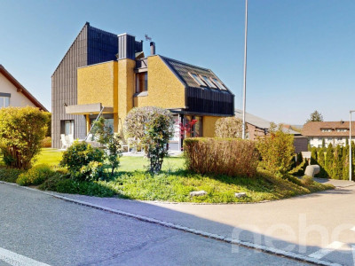 Haus mit einzigartiger Architektur und grossem Gartenparadies image 1