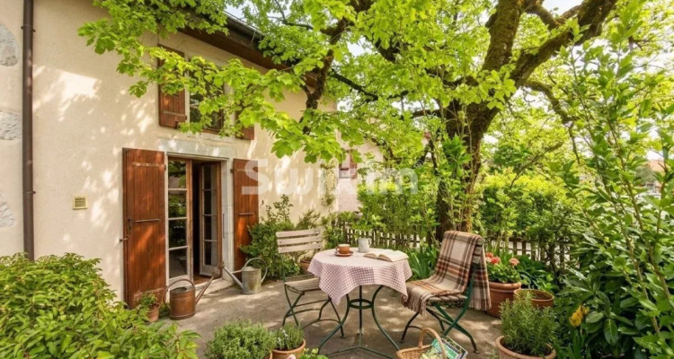 Large village house in Dardagny with garden image 1