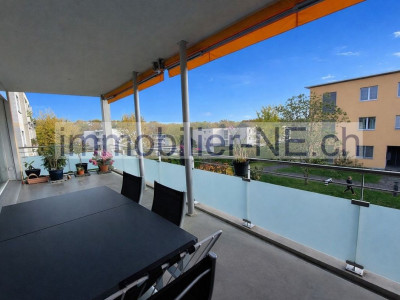 Appartement lumineux de 4,5 pièces avec terrasse et place de parc intérieure image 1