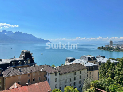 Superbe attique avec une vue imprenable sur le Lac ! image 1