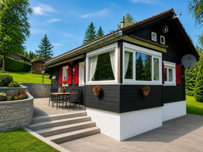 Deux chalets implantés sur une vaste parcelle ensoleillée image 1