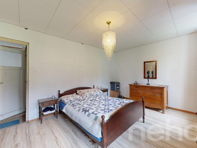 Villa de 180m² au Locle : Fort Potentiel et Vue Nature Imprenable image 9