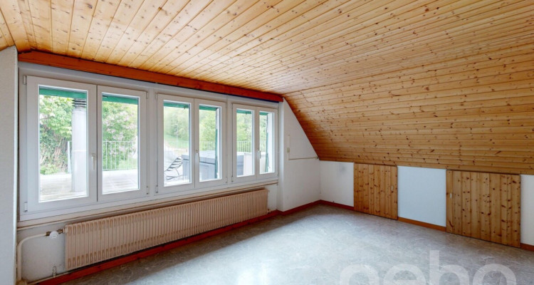 Villa de 180m² au Locle : Fort Potentiel et Vue Nature Imprenable image 11
