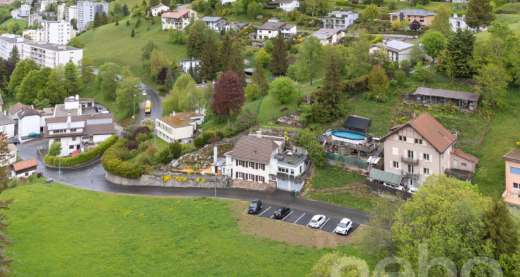 Villa de 180m² au Locle : Fort Potentiel et Vue Nature Imprenable image 12