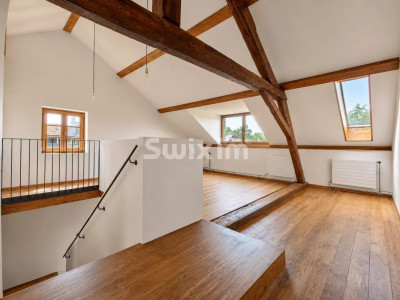 In Anières, a 6.5-room house in an expertly renovated former dairy image 2