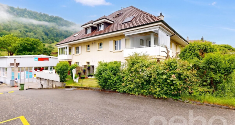 Charmante 3.5-Zimmerwohnung mit offener Galerie und Cheminée image 1