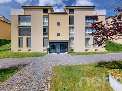 Duplex contemporain de 5,5 pièces avec jardin à Cortaillod image 1