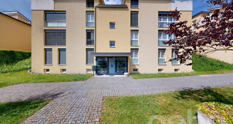 Duplex contemporain de 5,5 pièces avec jardin à Cortaillod image 1