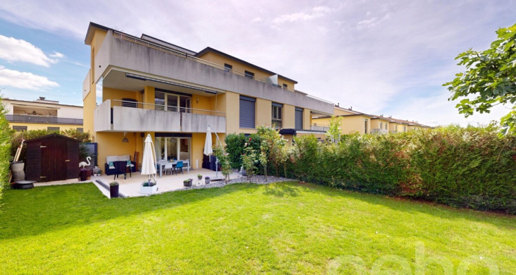Duplex contemporain de 5,5 pièces avec jardin à Cortaillod image 2