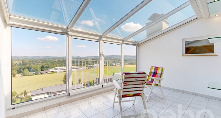 Sonniges Doppeleinfamilienhaus mit Wintergarten und Weitsicht image 3