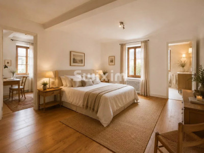 In a beautiful house with a garden, a fully renovated apartment with its magnificent master suite image 1