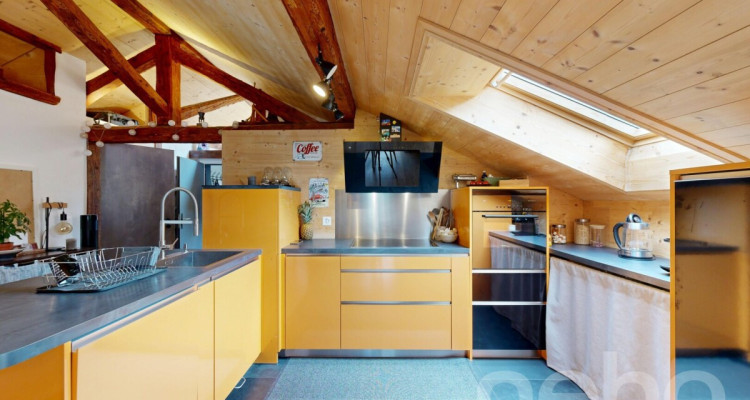 Immeuble 2 appartements 3.5 + 1 Attique 3.5 entièrement rénové. image 4