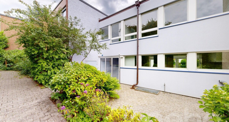 Familienfreundliches Mittelhaus mit Wintergarten und Photovoltaik image 2