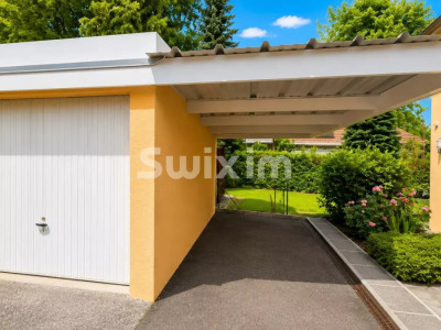 Family house with garden, veranda, garage, and covered parking space image 4