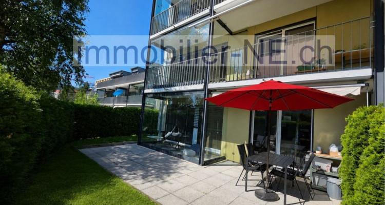 Bel appartement de 3,5 pièces, bénéficiant dun jardin privatif et dune place de parc intérieure image 1