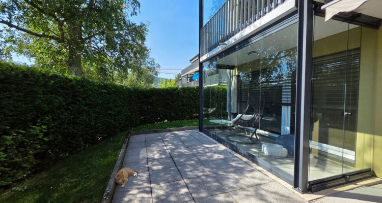 Bel appartement de 3,5 pièces, bénéficiant dun jardin privatif et dune place de parc intérieure image 2