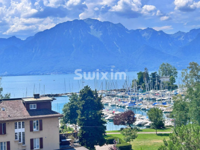 Luxe épuré avec vue sur le lac ! Appartement 3.5 pièces neuf avec balcon ! image 1