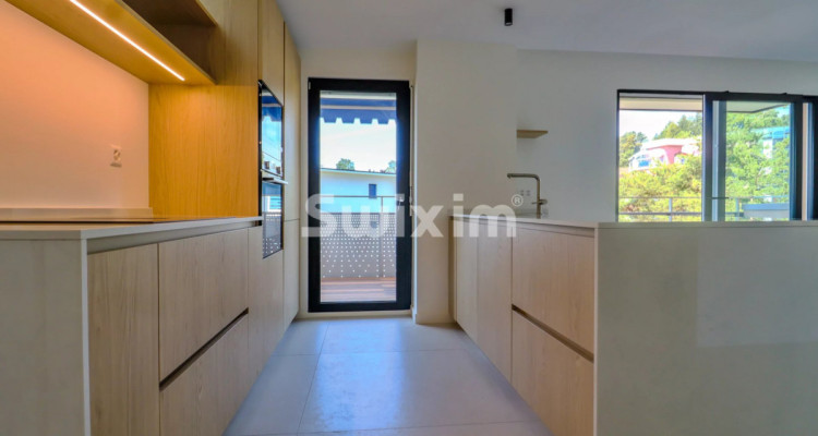 Luxe épuré avec vue sur le lac ! Appartement 3.5 pièces neuf avec balcon ! image 4