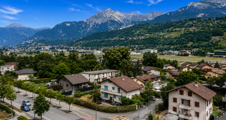 Maison familiale avec deux appartements et fort potentiel à Sion image 4