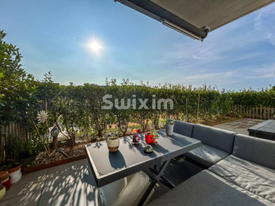 Bel appartement 3.5 pièces en rez-de-chaussée avec terrasse privative image 1
