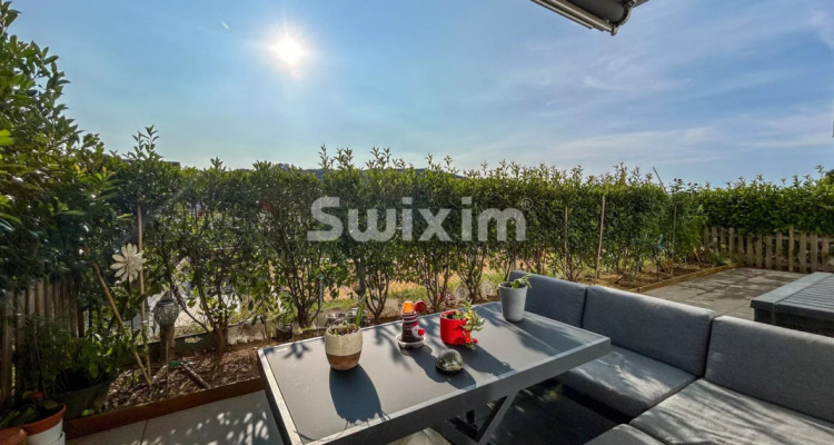 Bel appartement 3.5 pièces en rez-de-chaussée avec terrasse privative image 1