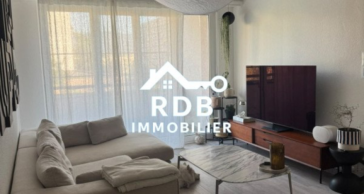 Appartement de 3 pièces au 5ème étage situé à Onex 1213 image 1