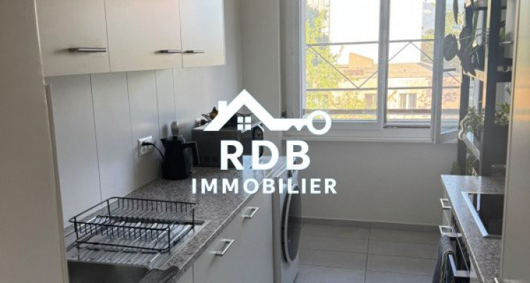Appartement de 3 pièces au 5ème étage situé à Onex 1213 image 2