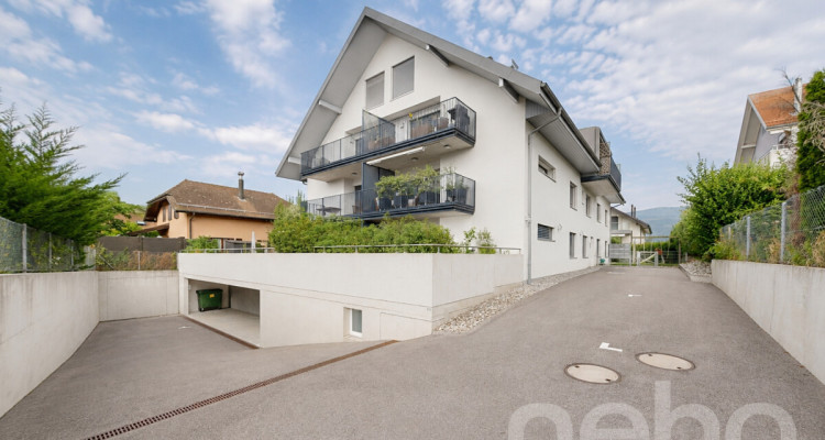 Appartement Minergie avec balcon, box double et local indépendant image 1
