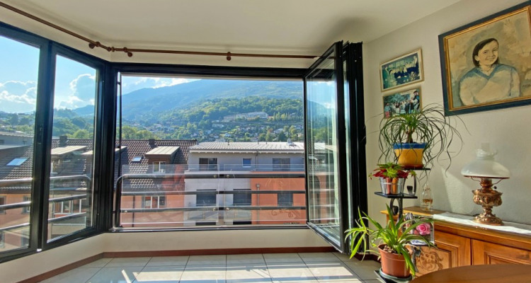 FOTI IMMO - Appartement de 4,5 pièces avec une belle vue dégagée. image 4