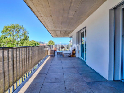 Exclusivité ! Vivez dans un village & confort : Appartement 5.5 pièces, moderne avec grande terrasse, moins de 7 minutes de la gare ! image 2