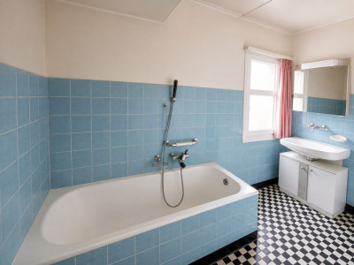 Maison villageoise avec jardin offrant deux appartements et un espace commercial image 10