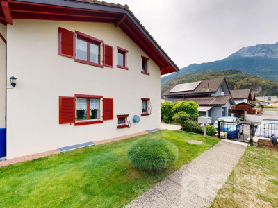 Maison avec jardin et terrasse plein sud à Collombey idéalement située image 1