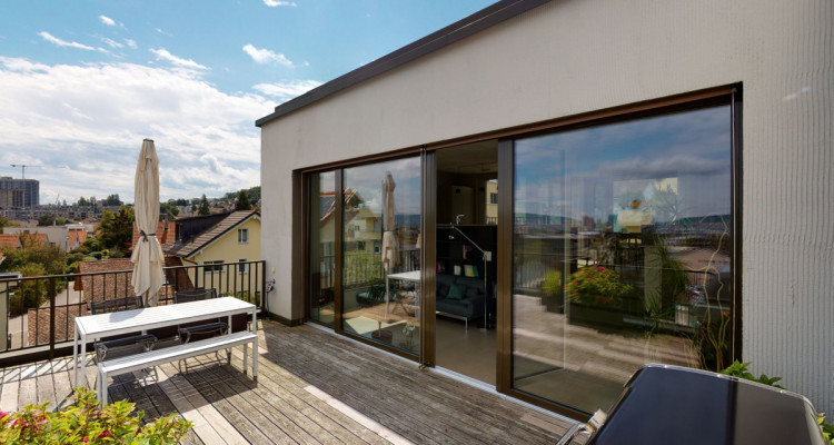 Moderne Duplex-Attika mit spektakulärer Aussicht in Zürich image 2